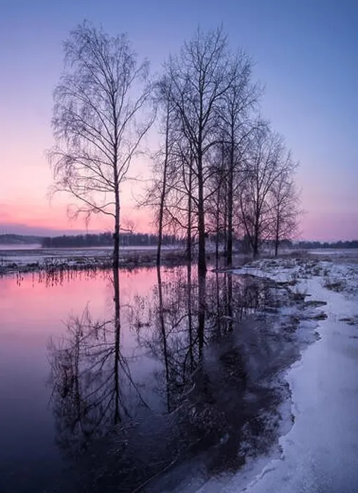 Framed Print : Winter landscape with sunset and smooth river at evening in Finland Framed Print : Winter landscape with sunset and smooth river at evening in Finland