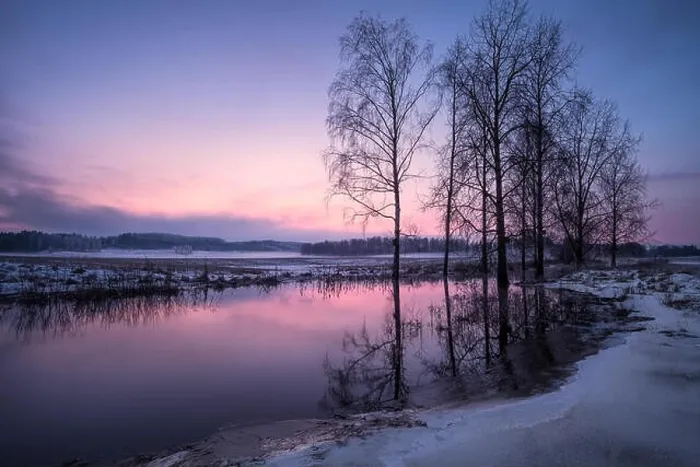 Framed Print : Winter landscape with sunset and smooth river at evening in Finland Framed Print : Winter landscape with sunset and smooth river at evening in Finland