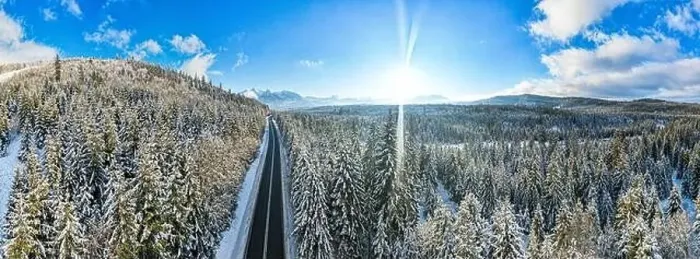 Framed Print : Winter Road in Mountains. Drone View Framed Print : Winter Road in Mountains. Drone View