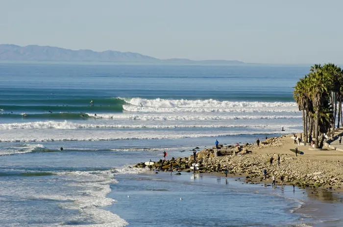 Framed Print : Winter swell and surfers at Surfers Point Framed Print : Winter swell and surfers at Surfers Point