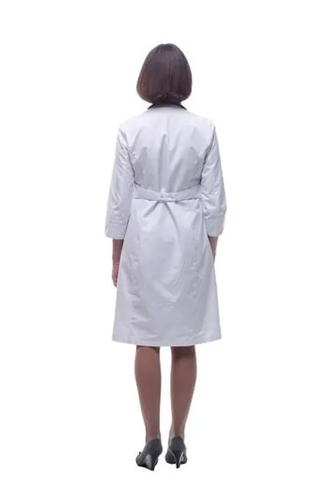 Framed Print : woman doctor is looking intently at the white screen Framed Print : woman doctor is looking intently at the white screen