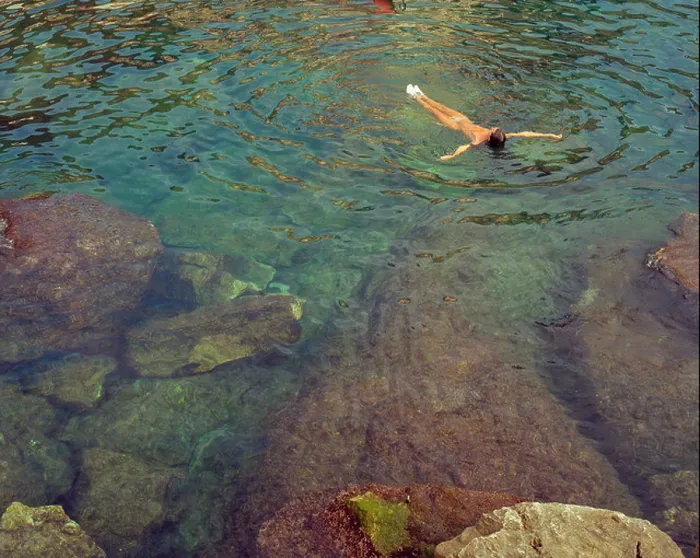 Framed Print : Woman floating on her back in the water Framed Print : Woman floating on her back in the water