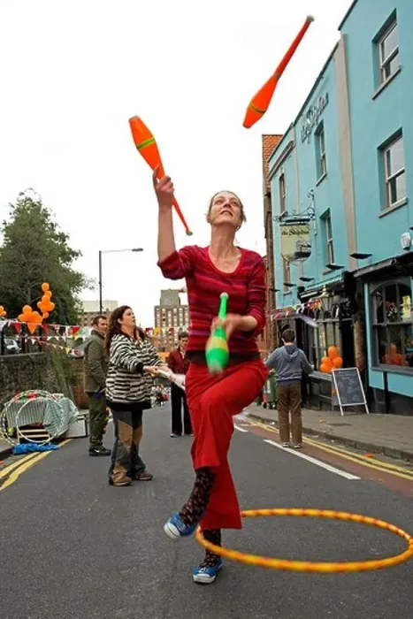 Framed Print : Woman juggler at street festival Bristol UK Framed Print : Woman juggler at street festival Bristol UK