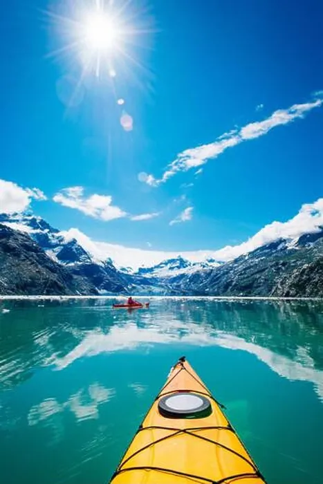 Framed Print : Woman kayaking in Glacier Bay National Park with glacier in background Framed Print : Woman kayaking in Glacier Bay National Park with glacier in background