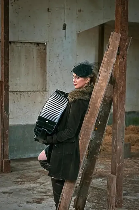 Framed Print : A woman playing an Accordian Framed Print : A woman playing an Accordian