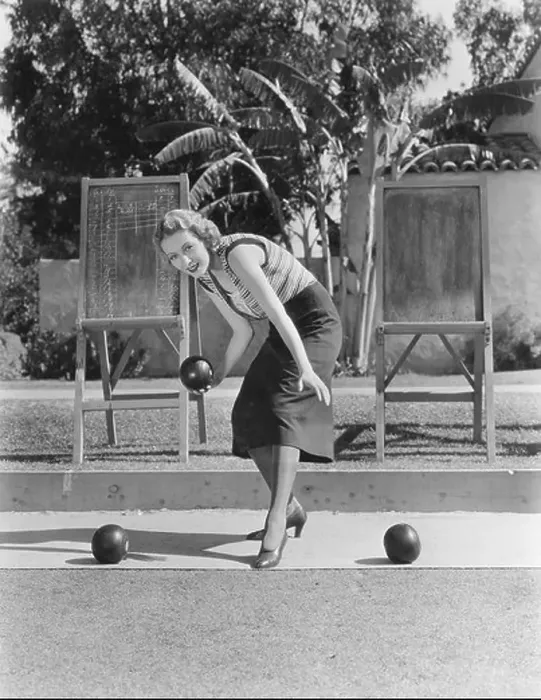 Framed Print : Woman playing bocce outdoors Framed Print : Woman playing bocce outdoors