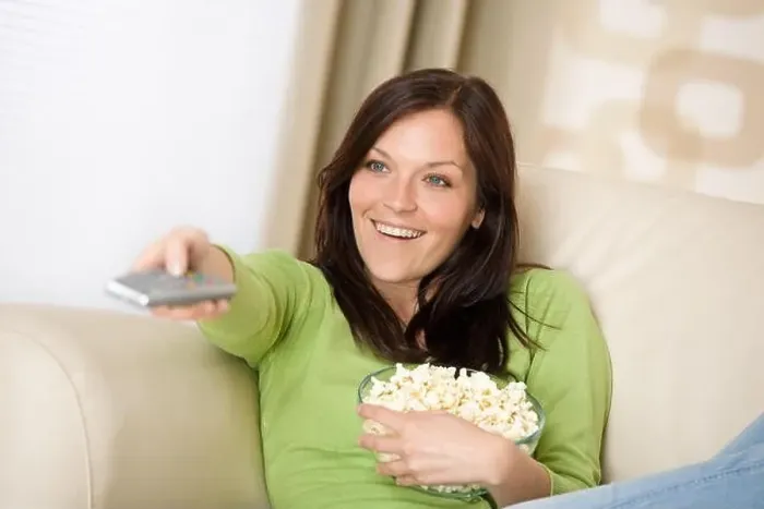 Framed Print : woman sofa television Framed Print : woman sofa television