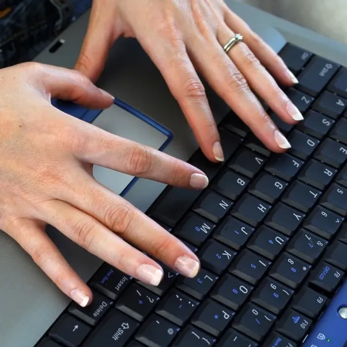 Framed Print : Womans hands typing on a laptop keyboard Framed Print : Womans hands typing on a laptop keyboard