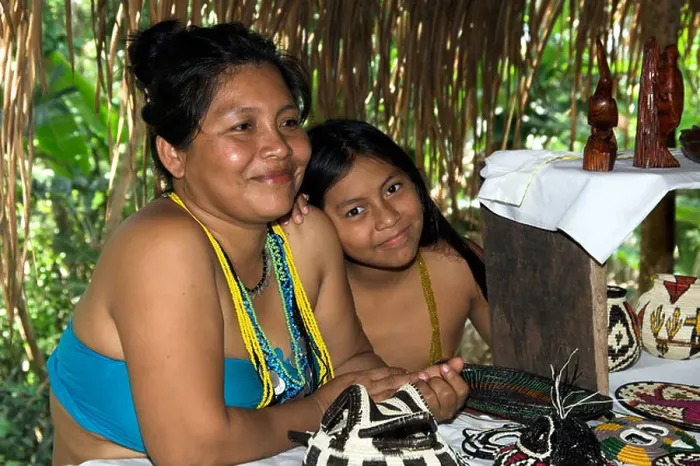 Framed Print : Women of the village sell craft items to tourists at the Embera Indian Village near Colon, Panama, Central America
