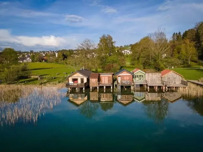 Framed Print : Wonderful bathing huts and boat sheds at the Irrsee in Austria Framed Print : Wonderful bathing huts and boat sheds at the Irrsee in Austria