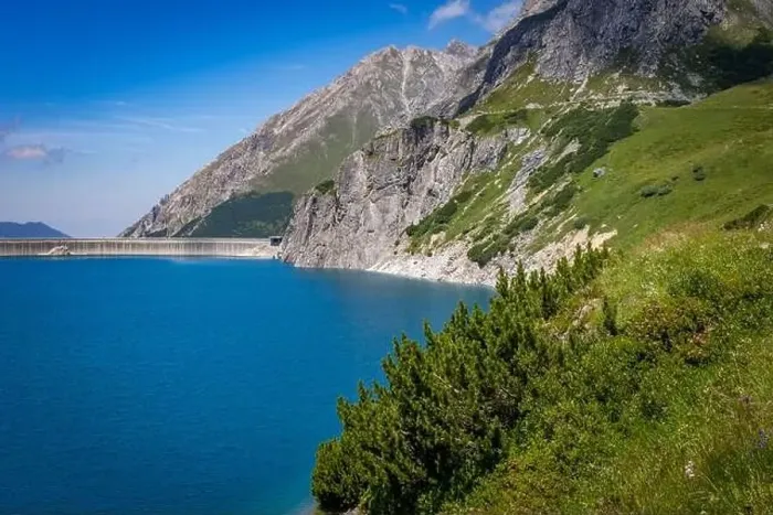 Framed Print : Wonderful landscape at the Luenersee with dam wall and rocks in Vorarlberg, Austria Framed Print : Wonderful landscape at the Luenersee with dam wall and rocks in Vorarlberg, Austria