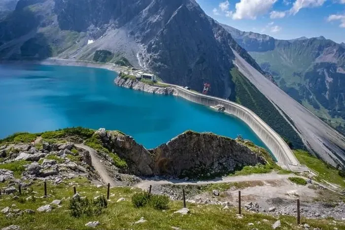 Framed Print : Wonderful landscape at the Luenersee with dam wall and rocks in Vorarlberg, Austria Framed Print : Wonderful landscape at the Luenersee with dam wall and rocks in Vorarlberg, Austria