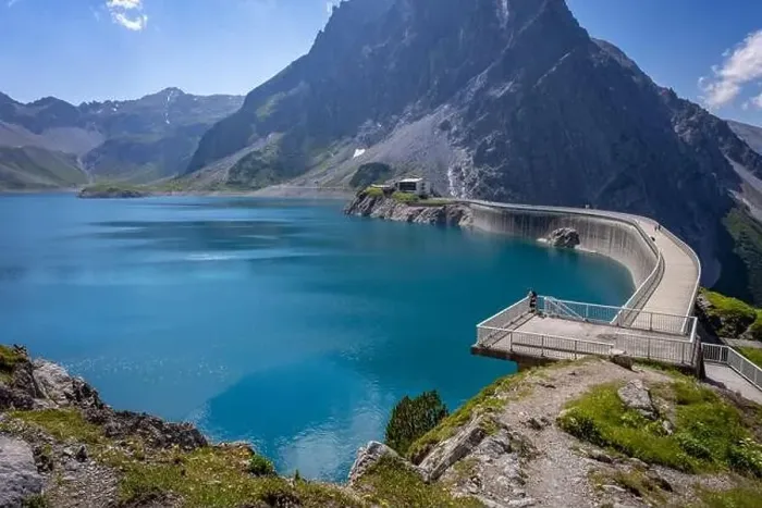 Framed Print : Wonderful landscape at the Luenersee with dam wall and rocks in Vorarlberg, Austria Framed Print : Wonderful landscape at the Luenersee with dam wall and rocks in Vorarlberg, Austria
