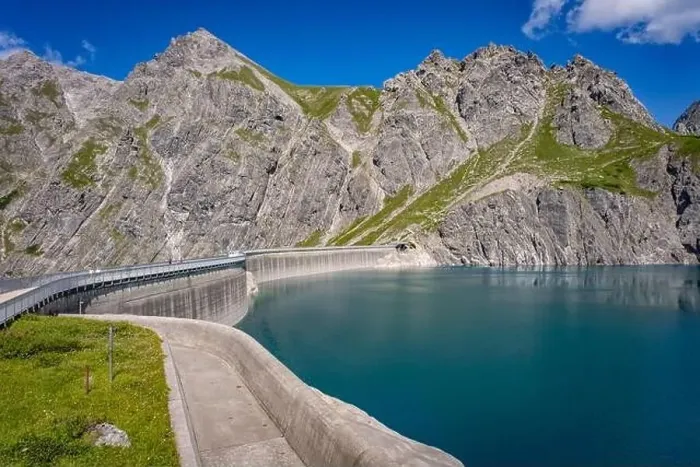 Framed Print : Wonderful landscape at the Luenersee with dam wall and rocks in Vorarlberg, Austria Framed Print : Wonderful landscape at the Luenersee with dam wall and rocks in Vorarlberg, Austria