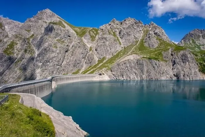 Framed Print : Wonderful landscape at the Luenersee with dam wall and rocks in Vorarlberg, Austria Framed Print : Wonderful landscape at the Luenersee with dam wall and rocks in Vorarlberg, Austria