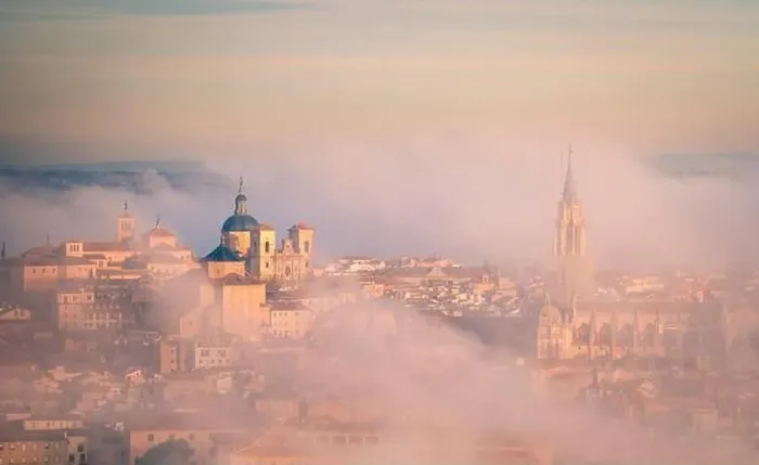 Framed Print : From above wonderful landscape of medieval castle built over city in misty colorful sunrise surrounded by clouds Framed Print : From above wonderful landscape of medieval castle built over city in misty colorful sunrise surrounded by clouds