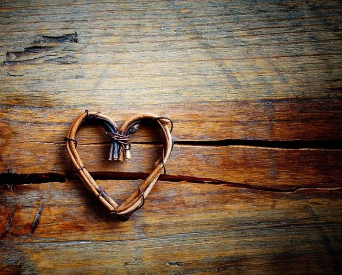 Framed Print : Wooden background with willow heart, selective focus Framed Print : Wooden background with willow heart, selective focus