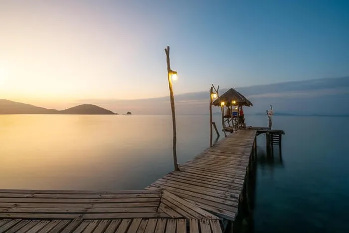 Framed Print : Wooden bar in sea and hut with clear sunrise sky in Koh Mak at Trat, Thailand. Summer, Travel, Vacation and Holiday. Relax and traveling at sea concep Framed Print : Wooden bar in sea and hut with clear sunrise sky in Koh Mak at Trat, Thailand. Summer, Travel, Vacation and Holiday. Relax and traveling at sea concep