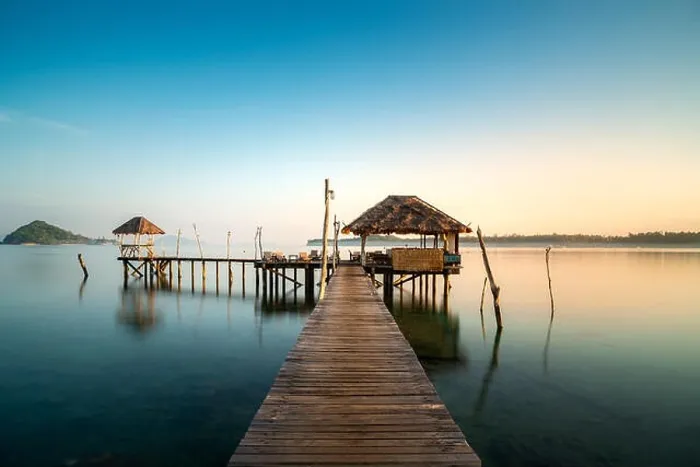 Framed Print : Wooden bar in sea and hut with clear sunrise sky in Koh Mak at Trat, Thailand. Summer, Travel, Vacation and Holiday concept Framed Print : Wooden bar in sea and hut with clear sunrise sky in Koh Mak at Trat, Thailand. Summer, Travel, Vacation and Holiday concept