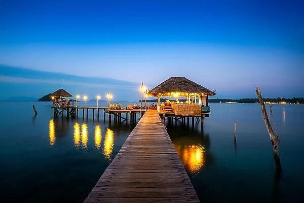 Wooden bar in sea and hut with night sky in Koh Mak at Trat, Thailand. Summer, Travel, Vacation and Holiday concept