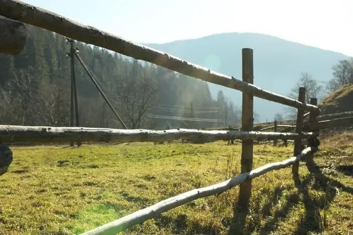 Framed Print : Wooden fence in Carpathian mountains in sunny day Framed Print : Wooden fence in Carpathian mountains in sunny day