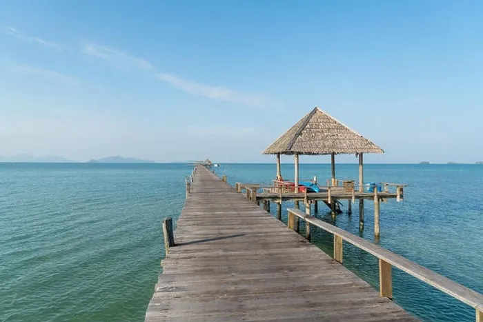 Framed Print : Wooden pier with boat in Phuket, Thailand. Summer, Travel, Vacation and Holiday concept Framed Print : Wooden pier with boat in Phuket, Thailand. Summer, Travel, Vacation and Holiday concept