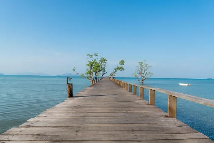 Framed Print : Wooden pier with boat in Phuket, Thailand. Summer, Travel, Vacation and Holiday concept Framed Print : Wooden pier with boat in Phuket, Thailand. Summer, Travel, Vacation and Holiday concept