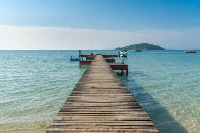 Framed Print : Wooden pier with boat in Phuket, Thailand. Summer, Travel, Vacation and Holiday concept