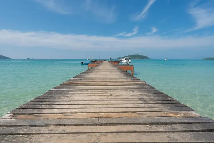Framed Print : Wooden pier with boat in Phuket, Thailand. Summer, Travel, Vacation and Holiday concept Framed Print : Wooden pier with boat in Phuket, Thailand. Summer, Travel, Vacation and Holiday concept