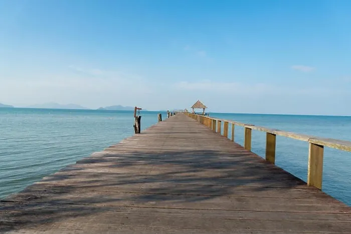 Framed Print : Wooden pier with boat in Phuket, Thailand. Summer, Travel, Vacation and Holiday concept Framed Print : Wooden pier with boat in Phuket, Thailand. Summer, Travel, Vacation and Holiday concept