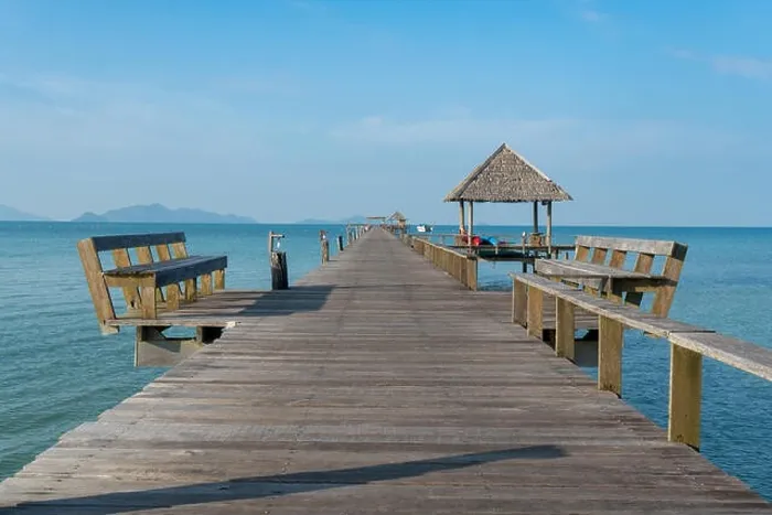 Framed Print : Wooden pier with boat in Phuket, Thailand. Summer, Travel, Vacation and Holiday concept Framed Print : Wooden pier with boat in Phuket, Thailand. Summer, Travel, Vacation and Holiday concept