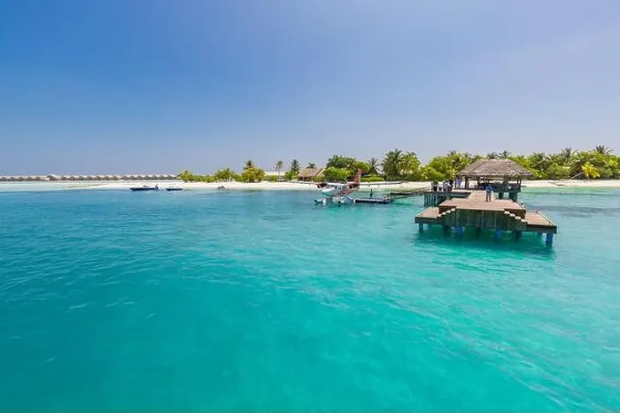 Framed Print : Wooden pier and jetty with seaplane at tropical island resort, Maldives. Luxury summer travel. Arrive at summer holiday vacation island landscape Framed Print : Wooden pier and jetty with seaplane at tropical island resort, Maldives. Luxury summer travel. Arrive at summer holiday vacation island landscape