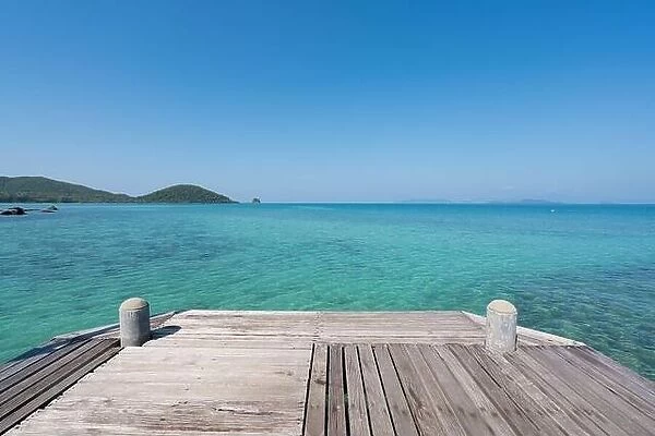 Wooden pier with summer blue sea and sky background in Phuket, Thailand. Summer, Vacation, Travel and Holiday concept