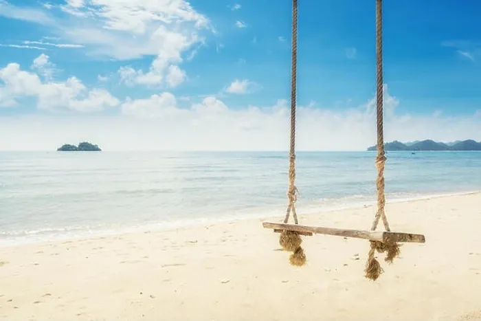 Framed Print : Wooden swing chair hanging on tree near beach at island in Phuket, Thailand. Summer Vacation Travel and Holiday concept Framed Print : Wooden swing chair hanging on tree near beach at island in Phuket, Thailand. Summer Vacation Travel and Holiday concept