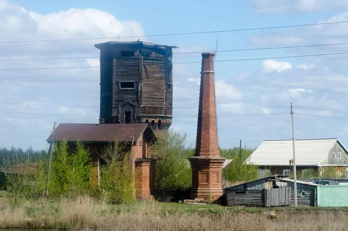 Framed Print : Wooden water tower and brick chimney beside Trans Siberian Railway, village near Barabinsk, Siberia, Russia Framed Print : Wooden water tower and brick chimney beside Trans Siberian Railway, village near Barabinsk, Siberia, Russia