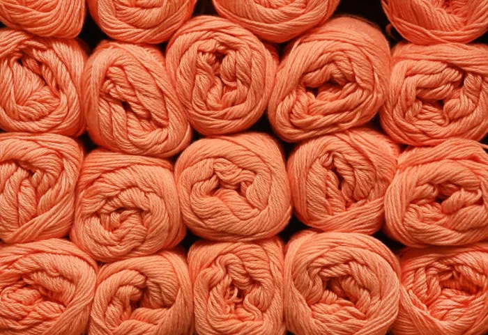 Framed Print : Wool rolls in a shelf as a background Framed Print : Wool rolls in a shelf as a background