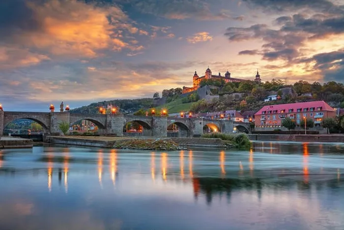 Framed Print : Wurzburg, Germany. Cityscape image of Wurzburg with Old Main Bridge over Main river and Marienberg Fortress during beautiful autumn sunset Framed Print : Wurzburg, Germany. Cityscape image of Wurzburg with Old Main Bridge over Main river and Marienberg Fortress during beautiful autumn sunset