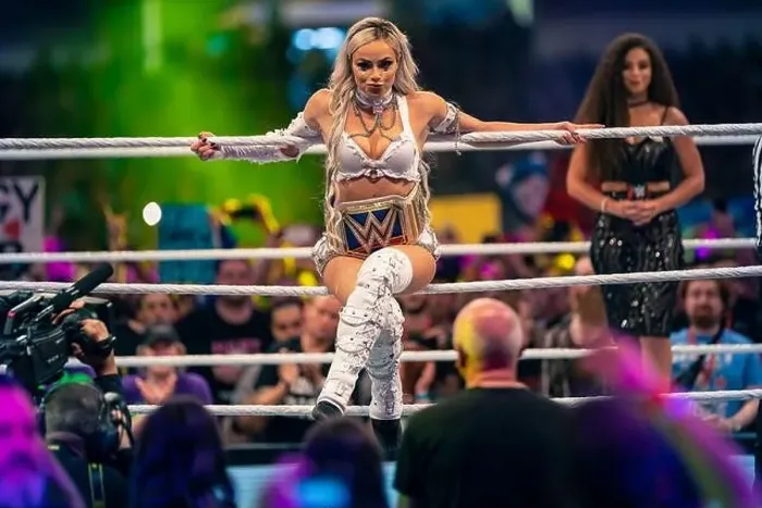 Framed Print : WWE Superstar Liv Morgan posing with the Women's Championship at WWE Clash at The Castle at Principality Stadium in Framed Print : WWE Superstar Liv Morgan posing with the Women's Championship at WWE Clash at The Castle at Principality Stadium in