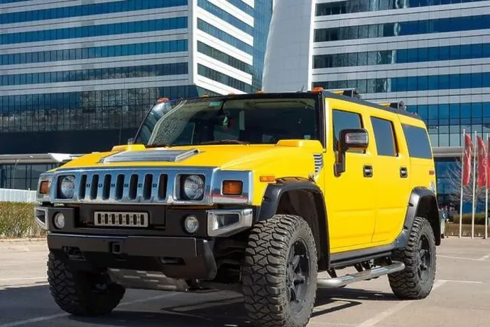 Framed Print : Yellow Hummer H2 outside the Capital Fort office building in Sofia Bulgaria, Eastern Europe, Balkans, EU Framed Print : Yellow Hummer H2 outside the Capital Fort office building in Sofia Bulgaria, Eastern Europe, Balkans, EU
