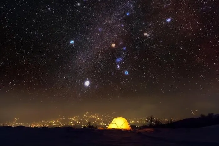Framed Print : Yellow tent lighted from the inside against the backdrop of glowing city lights and incredible starry sky. Amazing night landscape Framed Print : Yellow tent lighted from the inside against the backdrop of glowing city lights and incredible starry sky. Amazing night landscape