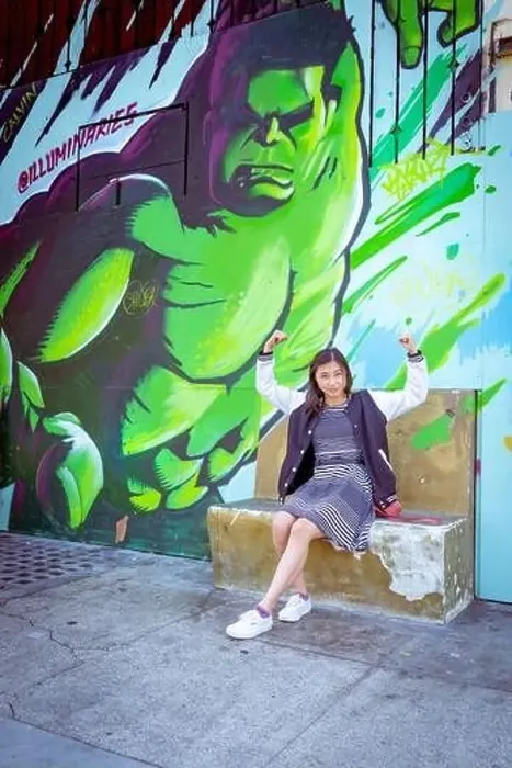 Framed Print : Young Asian Woman Does Power Poses While Waiting for the Bus in Iconic North Beach San Francisco