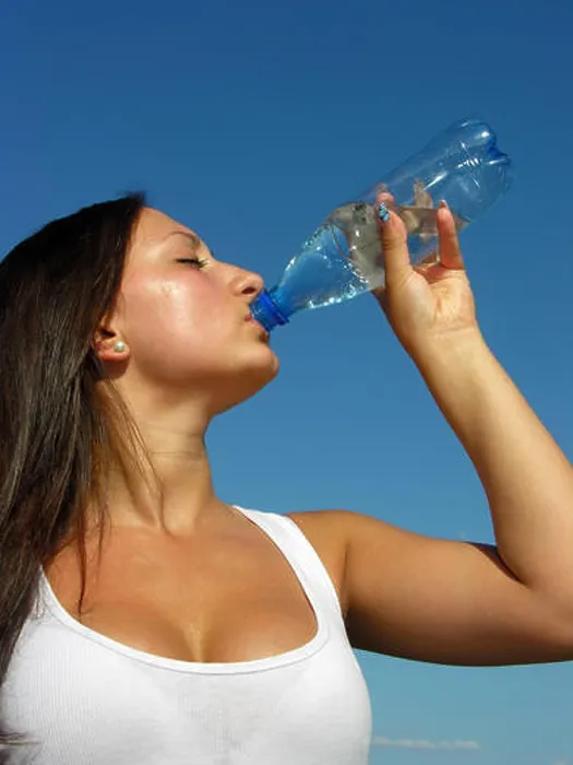Framed Print : young athletic woman drinks cold water in hot day, vertical composition Framed Print : young athletic woman drinks cold water in hot day, vertical composition