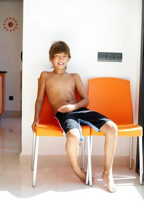 Framed Print : Young boy in a chair Framed Print : Young boy in a chair