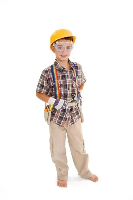 Framed Print : Young caucasian boy dressed in a carpenter outfit standing on a white background Framed Print : Young caucasian boy dressed in a carpenter outfit standing on a white background