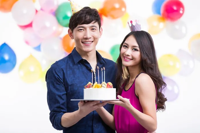 Framed Print : Young couple celebrating birthday Framed Print : Young couple celebrating birthday