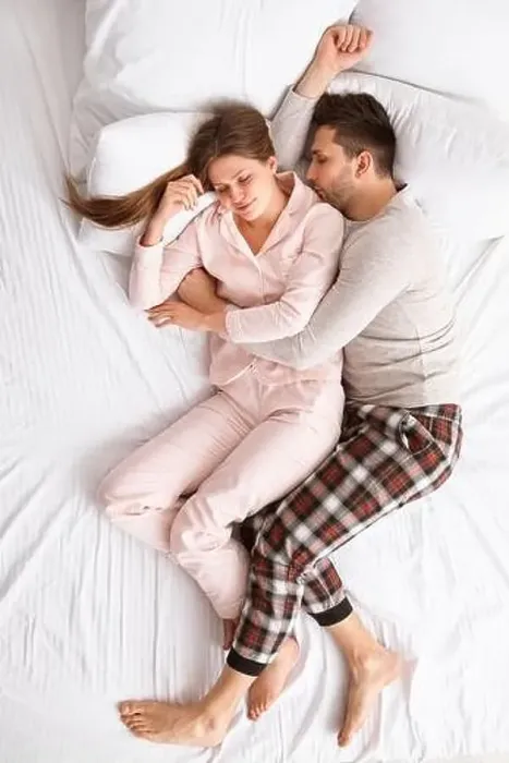 Framed Print : Young couple sleeping in bed Framed Print : Young couple sleeping in bed
