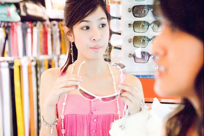 Framed Print : A young, cute, Thai woman shops for sundries and the things that she likes in Siam Square, Bangkok, Thailand Framed Print : A young, cute, Thai woman shops for sundries and the things that she likes in Siam Square, Bangkok, Thailand