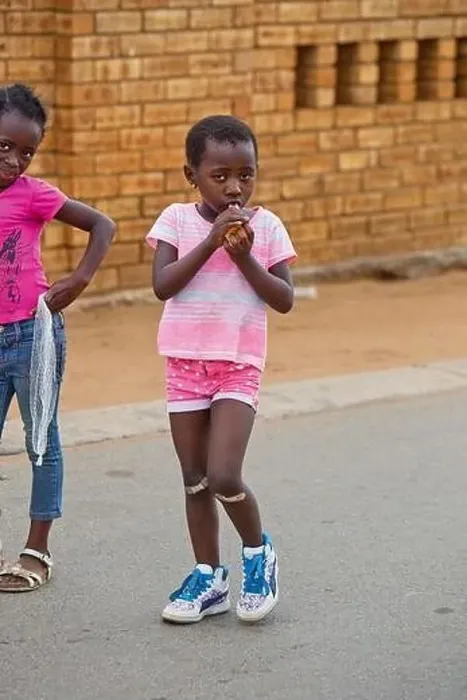 Framed Print : Young girl in Soweto township Framed Print : Young girl in Soweto township