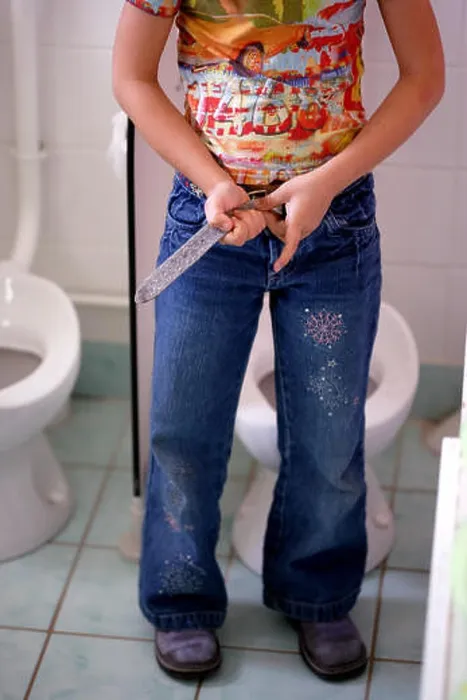 Framed Print : Young girl in the toilets at preschool Framed Print : Young girl in the toilets at preschool