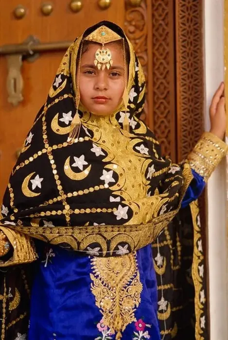 Framed Print : Young girl in traditional dress, Bahrain, Middle East Framed Print : Young girl in traditional dress, Bahrain, Middle East